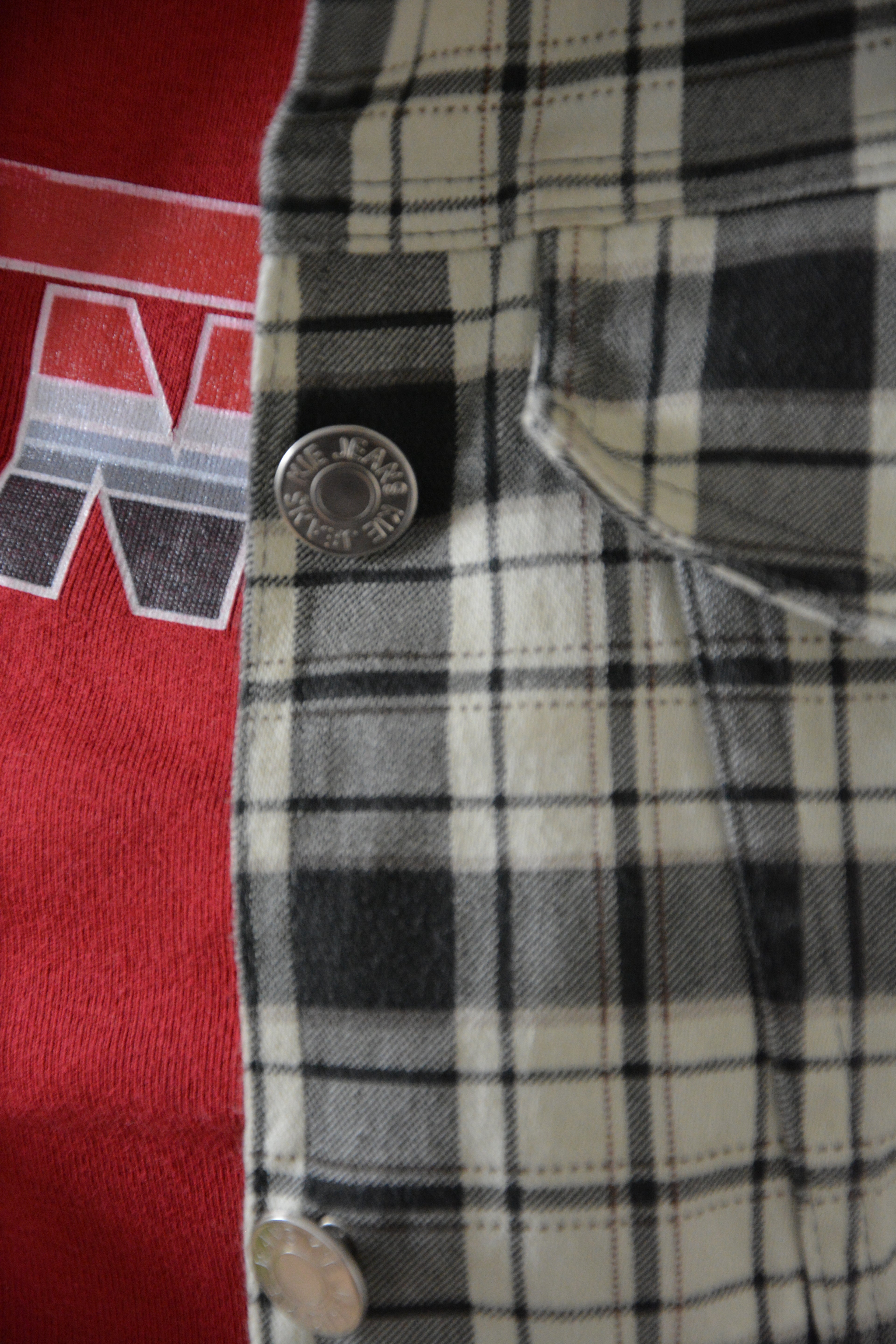 Veste courte sans manches à carreaux