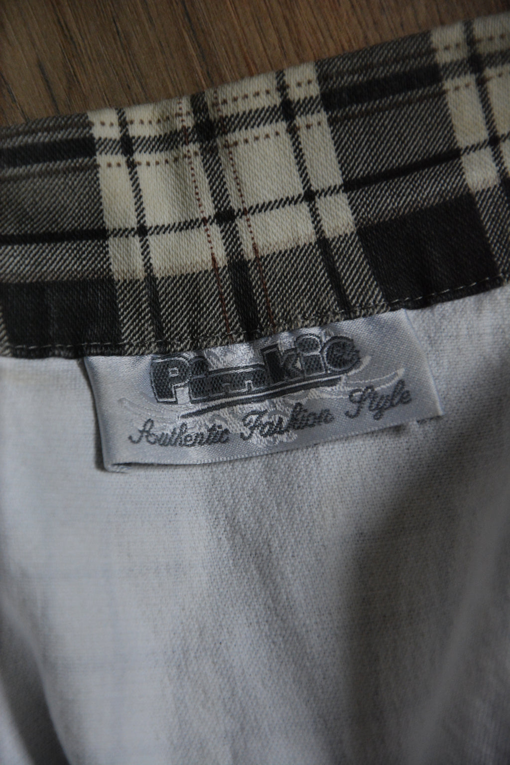 Veste courte sans manches à carreaux