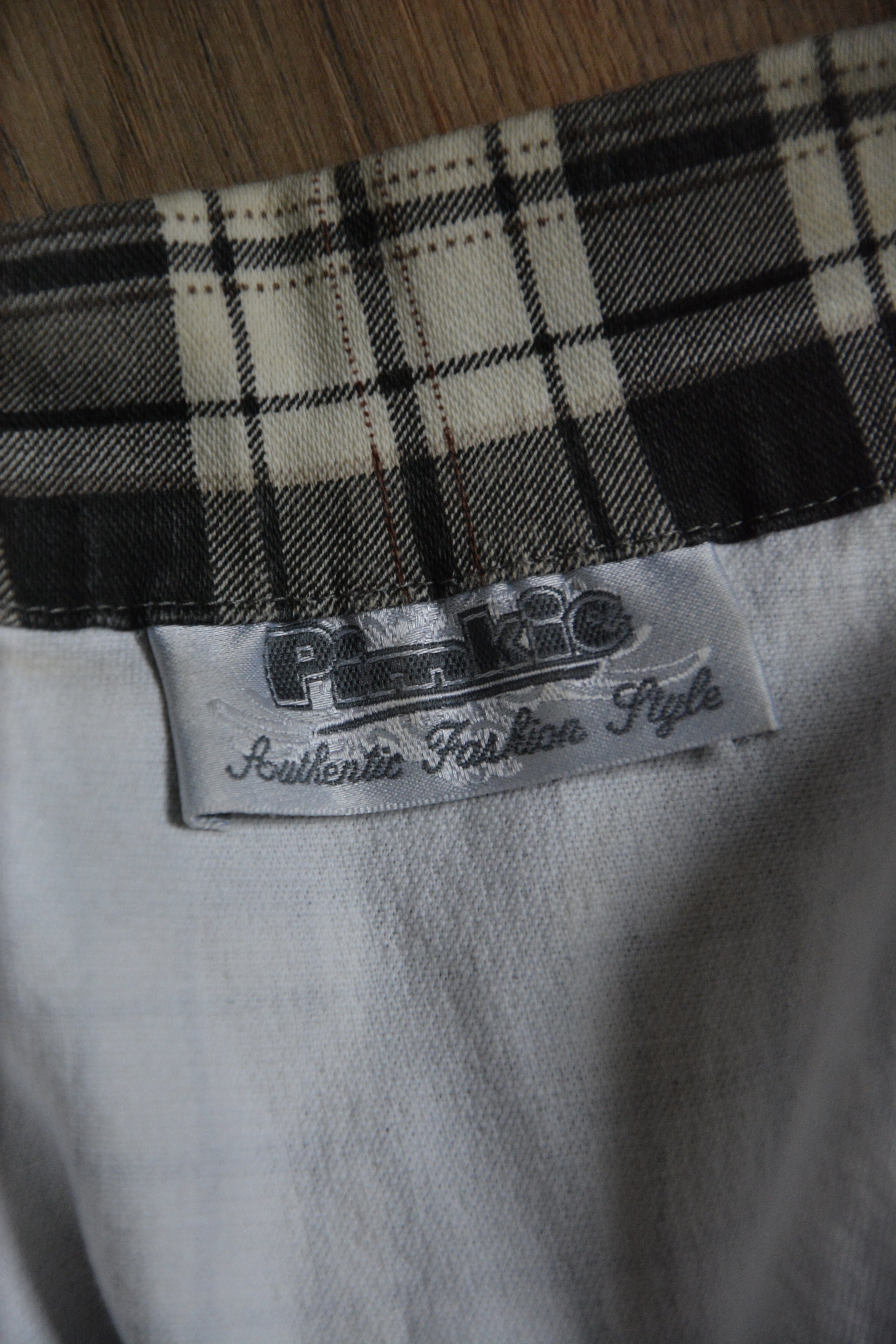 Veste courte sans manches à carreaux